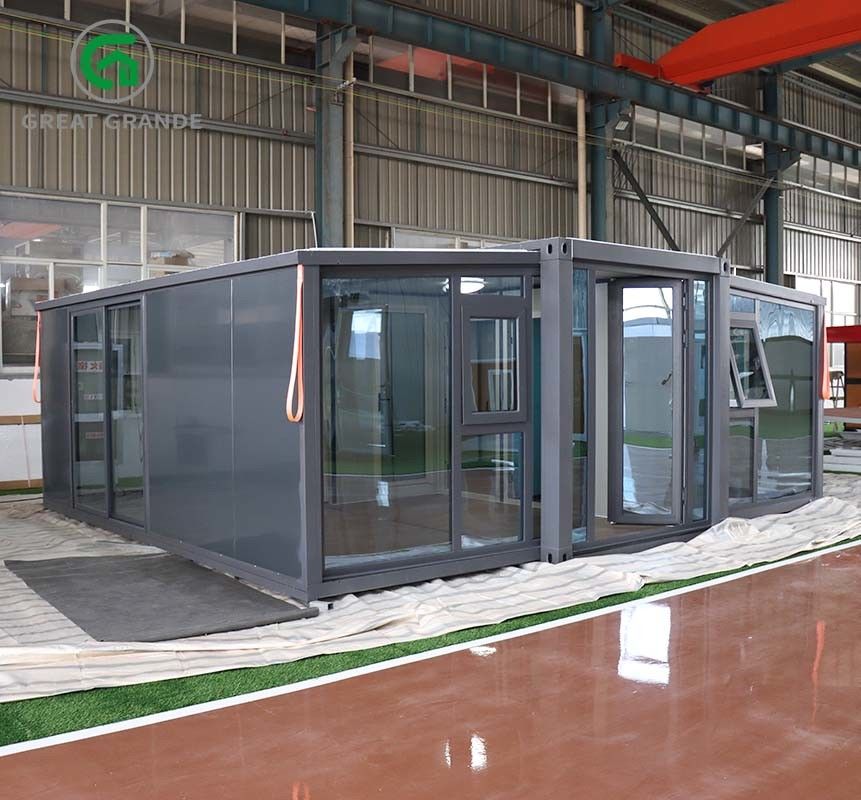 20ft uitbreidbare container Huisontwerp Zwart frame Zwart wandpaneel EPS gehard glas deur